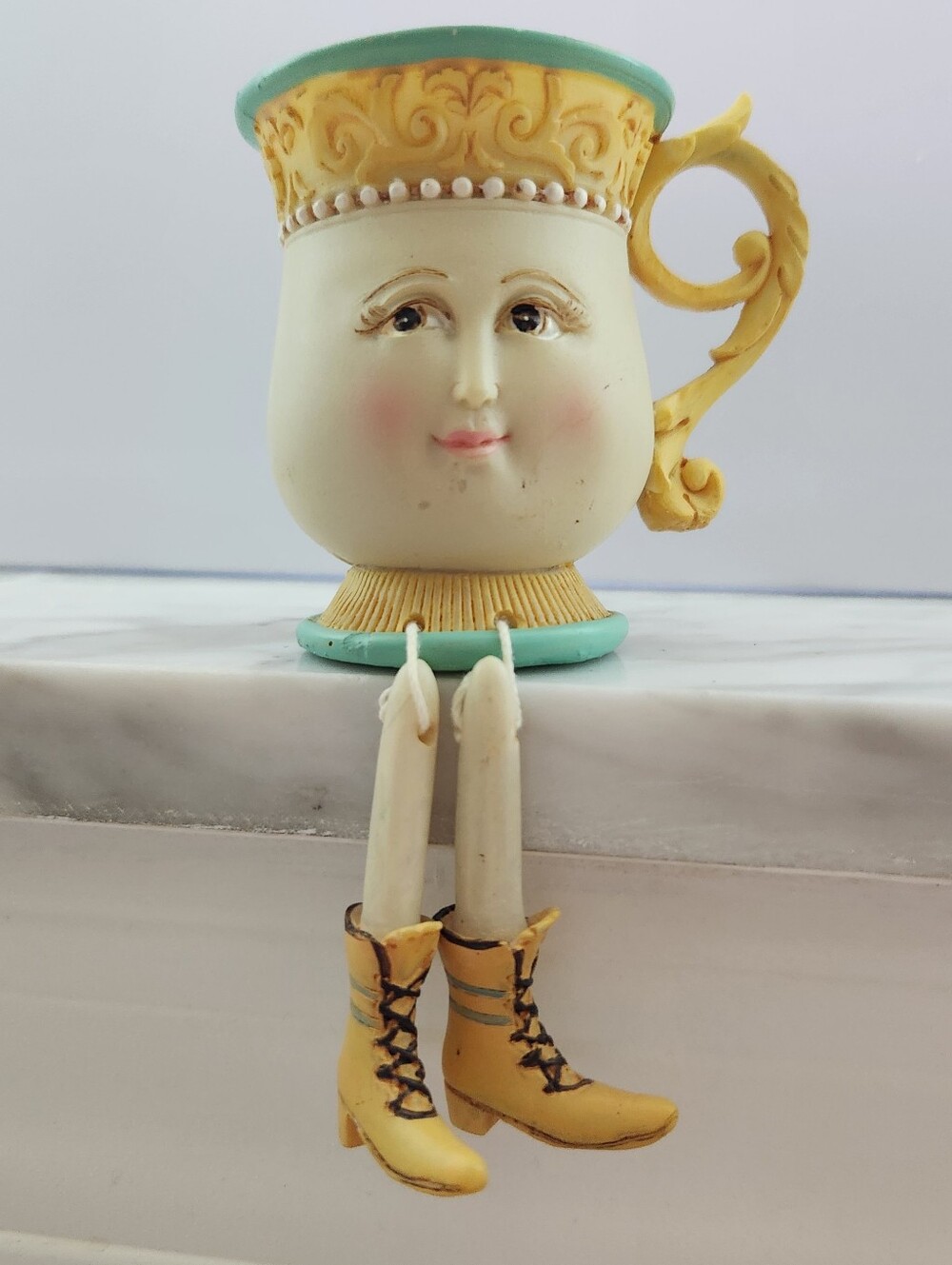 Vintage-style anthropomorphic teacup shelf sitter figurine